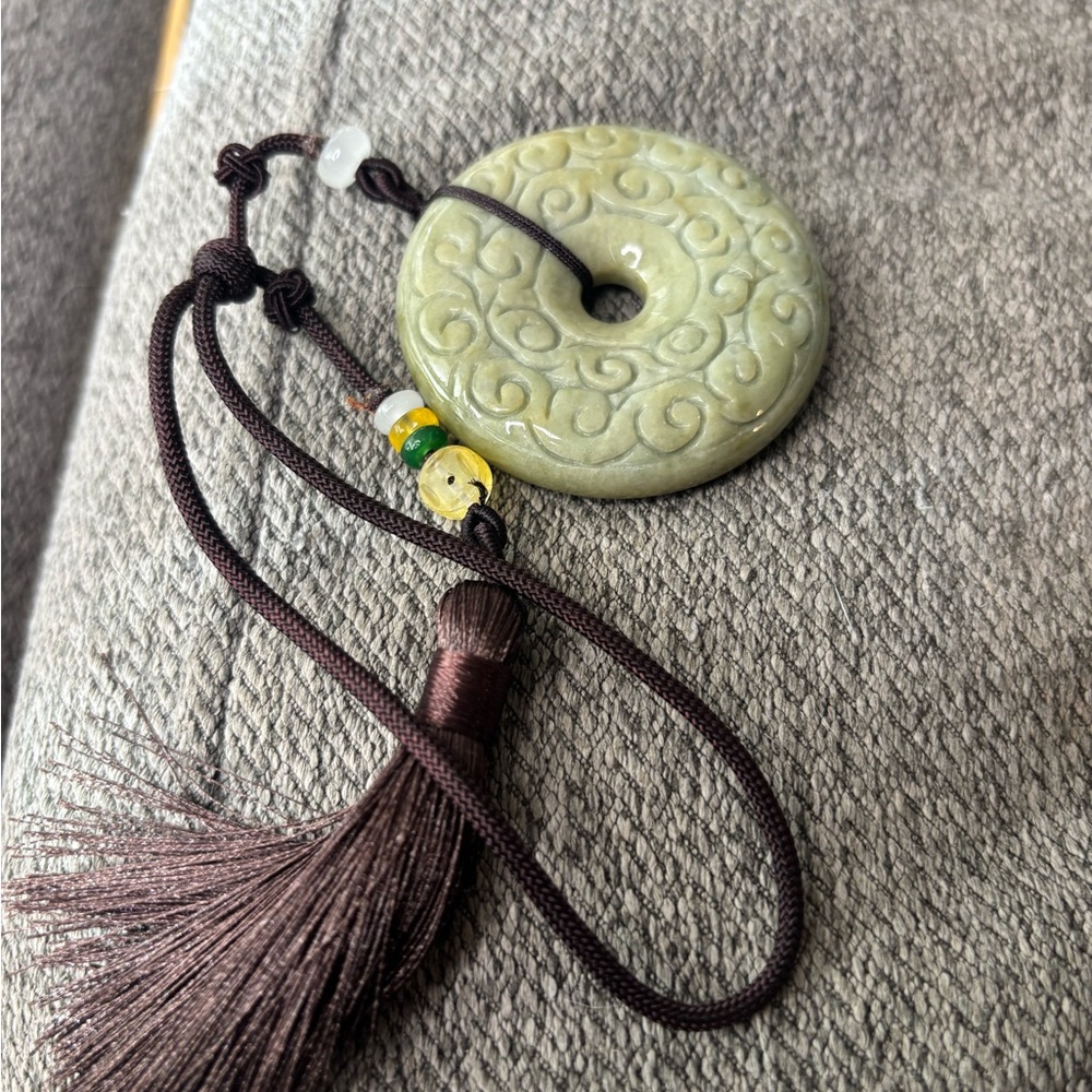 Green Jade Donut Pendant with Brown Tassle